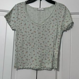 Frilly light blue shirt